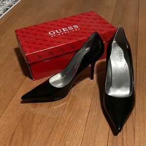Guess black patent pumps
